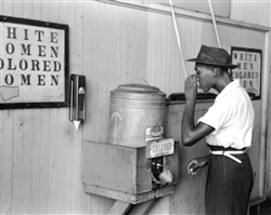 Drinking at "Colored" Water Cooler in Streetcar Terminal, Oklahoma City, Oklahoma, 1939