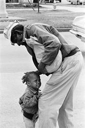 African American Man with Crying Child, 1962
